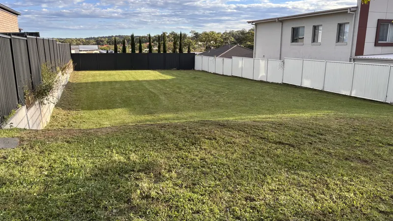 Large back yard cut fence to fence on a Logan block